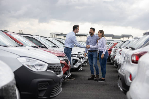 Car seller is meeting potential buyers