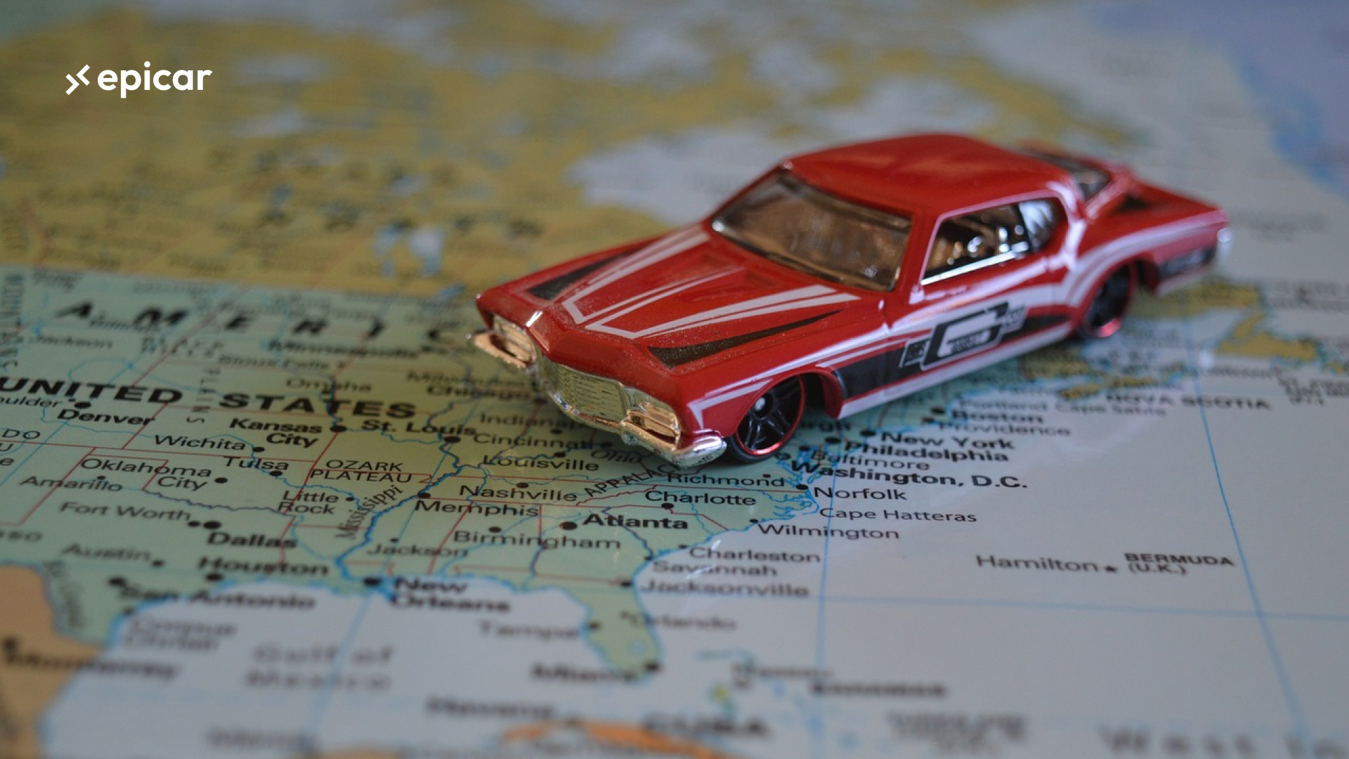 red car model on the map of the USA
